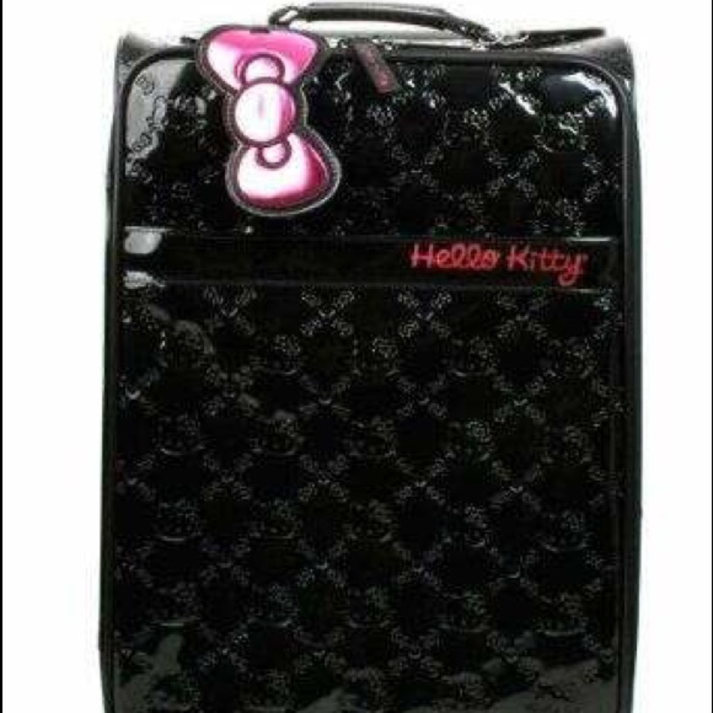 RARE LIMITED EDITION HELLO KITTY EMBOSSED PATENT LEATHER LUGGAGE